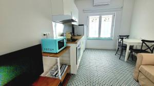 Kuchyňa alebo kuchynka v ubytovaní Casa Tina