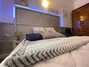 Letto o letti in una camera di Maestrale