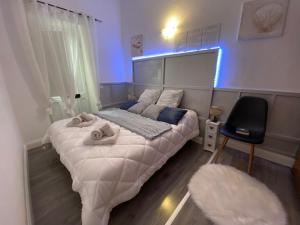 Letto o letti in una camera di Maestrale