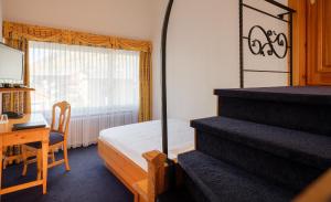 Postel nebo postele na pokoji v ubytování Walliserhof