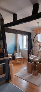 Ruang duduk di Appartement Le Verdoyant hyper centre avec Sauna et Parking