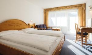 Postel nebo postele na pokoji v ubytování Walliserhof