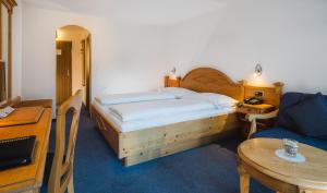 Postel nebo postele na pokoji v ubytování Walliserhof