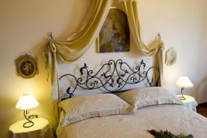 Cama ou camas em um quarto em Le Querce di Mamre