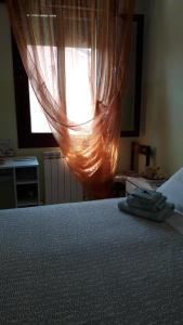 Кровать или кровати в номере Adria Bella LT Z00157