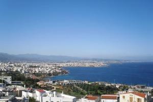 a view of a city and a body of water at Eolia apartment with panoramic Chania view in Chania Town