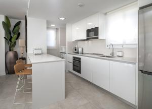 A kitchen or kitchenette at Magnificent penthouse with panoramics views