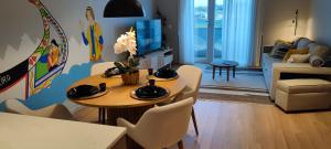 TV a/nebo společenská místnost v ubytování A Proa do Moliceiro