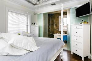 Llit o llits en una habitació de weforyou 3 BEDROOMS PENTHOUSE AT MALAGA CENTER