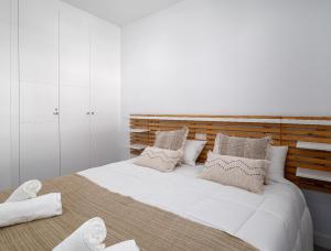 A bed or beds in a room at Magnificent penthouse with panoramics views