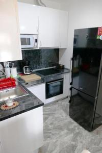 Kuchyň nebo kuchyňský kout v ubytování Villa Martinovic 2