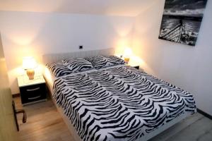 Postel nebo postele na pokoji v ubytování Villa Martinovic 2