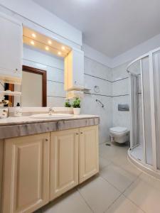 Kúpeľňa v ubytovaní MEDANO4YOU Red Mountain Sea View Holiday Home