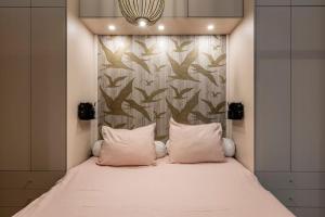Ένα ή περισσότερα κρεβάτια σε δωμάτιο στο Design apartment in scheepvaartkwartier Rotterdam
