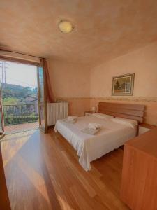 Posteľ alebo postele v izbe v ubytovaní Garden Villa Valentina