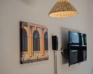 TV a/nebo společenská místnost v ubytování Wings House