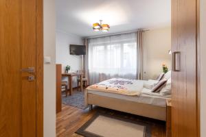Posteľ alebo postele v izbe v ubytovaní Orkana Home