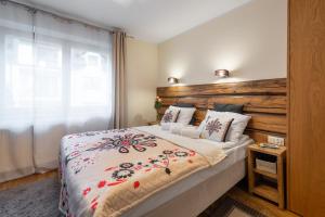 Posteľ alebo postele v izbe v ubytovaní Orkana Home
