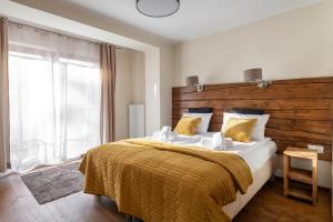 Posteľ alebo postele v izbe v ubytovaní Orkana Home