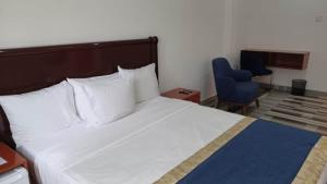 Katil atau katil-katil dalam bilik di Credence Resorts Aco