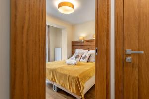 Posteľ alebo postele v izbe v ubytovaní Orkana Home