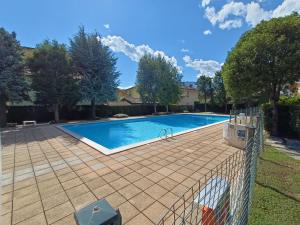 Bazén v ubytovaní House in a beautiful residence with garden, swimming pool and parking spot - Larihome A07 alebo v jeho blízkosti + 9 fotografií
