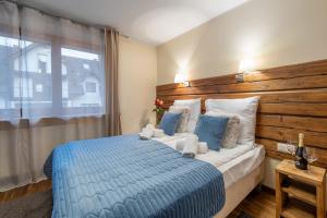Posteľ alebo postele v izbe v ubytovaní Orkana Home