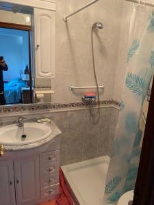 Koupelna v ubytování CASA DEL ARROYO + 8 fotografií