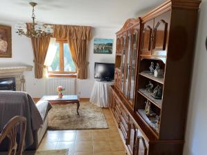 TV a/nebo společenská místnost v ubytování CASA DEL ARROYO