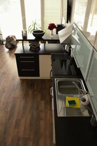a kitchen with a sink and a counter top at Private holiday house Vivendi in Liptovský Mikuláš