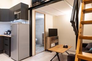 Kuchyňa alebo kuchynka v ubytovaní Duplex Ivoire au coeur de Montauban