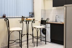 Kuchyňa alebo kuchynka v ubytovaní Duplex Ivoire au coeur de Montauban
