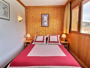 Una cama o camas en una habitación de Appartement Méribel, 2 pièces, 4 personnes - FR-1-182-23