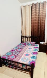 A bed or beds in a room at JJR Short stay-sharing