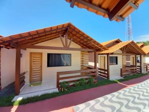 a rendering of a house with a flat screen tv at Pousada Aurora Boreal 2 in Alter do Chao