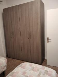 Łóżko lub łóżka w pokoju w obiekcie Appartamento AL PARCO
