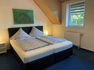 Postel nebo postele na pokoji v ubytování Schweier Krug
