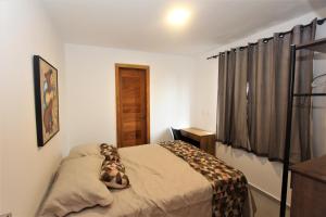 Katil atau katil-katil dalam bilik di Corais de Taipu Beach