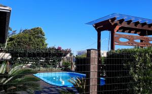 Vista de la piscina de Linda Casa Temporada com Piscina o alrededores