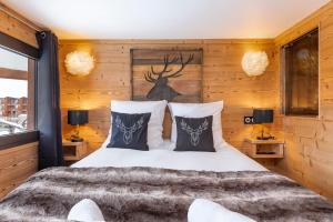 Val Thorens - Cosy Duplex Silveralp 004にあるベッド