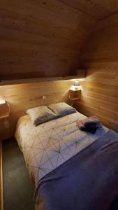 Postel nebo postele na pokoji v ubytování Chalet Sanset + 30 fotografií