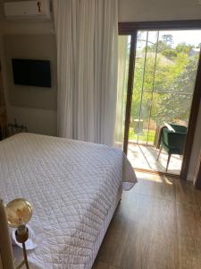 Locanda Montecielo - Vale dos Vinhedos客房内的一张或多张床位