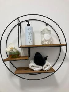 a round shelf with a black and white stuffed animal on it at The Smithfields, Newport in Newport +31 photos