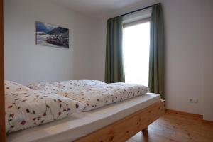 Posteľ alebo postele v izbe v ubytovaní Wolfhof_Ritten