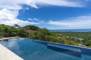 Piscina en o cerca de Casa Vista del Rey- A 5 Bedroom Ocean View luxury home LJ11
