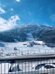 a view of a ski resort in the snow at Apartman VM in Bjelašnica