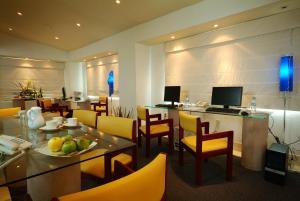 Μια τηλεόραση ή/και κέντρο ψυχαγωγίας στο Hotel Baruk Teleférico Centro Histórico