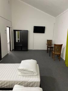 Katil atau katil-katil dalam bilik di GREEN APPLE GUEST House