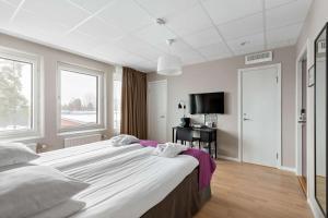 Postel nebo postele na pokoji v ubytování Best Western Plus Park Airport Hotel