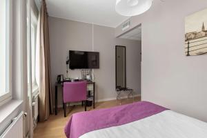 Postel nebo postele na pokoji v ubytování Best Western Plus Park Airport Hotel